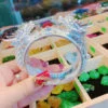 Lắc tay đầu rồng Phú Lê